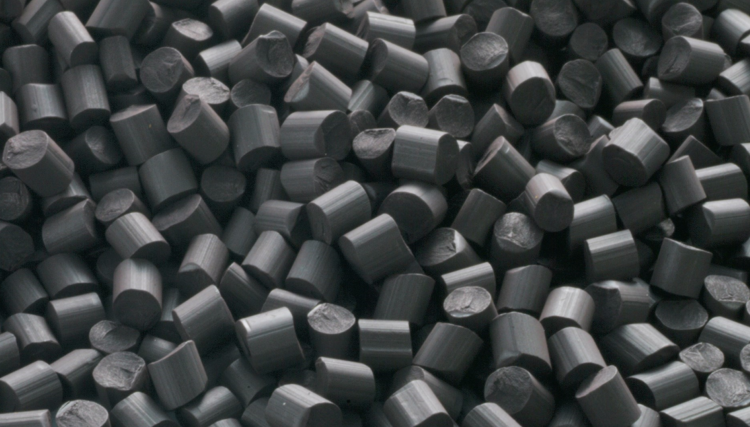 Ferrite-bonded magnetic compound granulate for injection molding